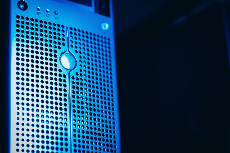 Server room hardware representing Oracle database security hardening and encryption at rest