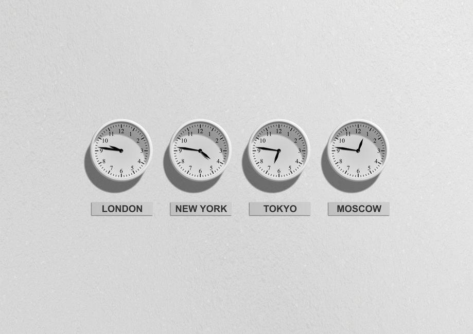 Wall clocks showing different time zones, like DBMS_SCHEDULER calendar schedules running Oracle jobs on time